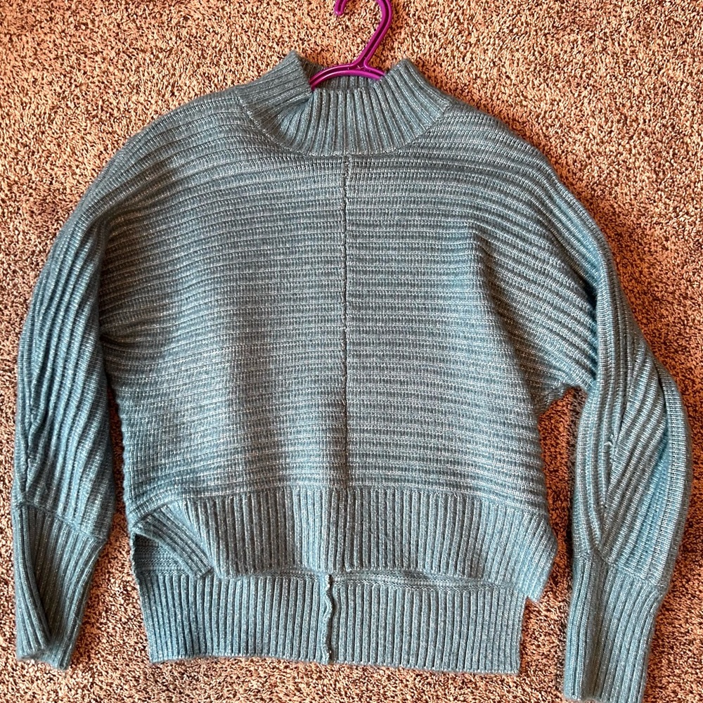 Woman’s Teal Sweater